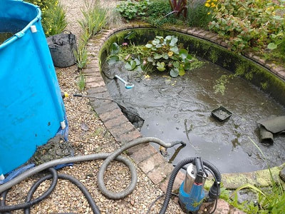Pond cleaning services in Norwich, Norfolk. A J Hutchinson - Garden & Pond Maintenance.