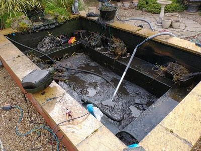 Pond cleaning services - A J Hutchinson - Garden & Pond Maintenance.